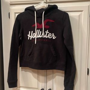 Like new Hollister hoodie. X Small black with red and white